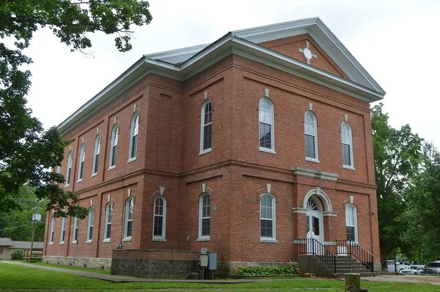 Front and eastern side of the Pope County Courthouse , located at 310 E. Main Street in downtown Golconda , Illinois , United States . Built in 1873, it is part of the Golconda Hi...