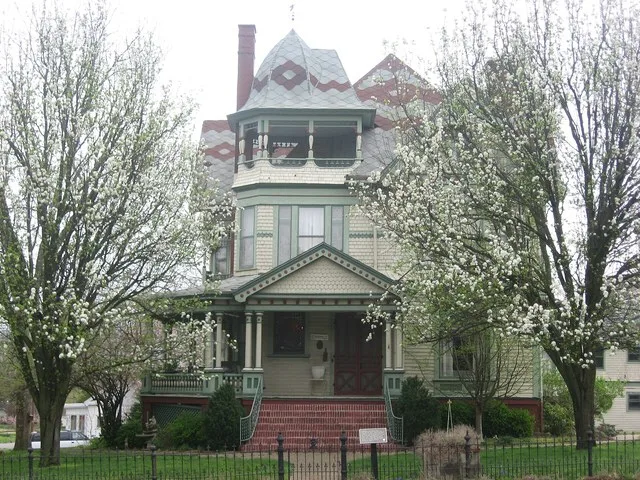 Front of the William W. Gray House , located at 119 N. Court Street ( Illinois Route 1 ) in Grayville , Illinois , United States . Built in 1895, it is listed on the National Regi...