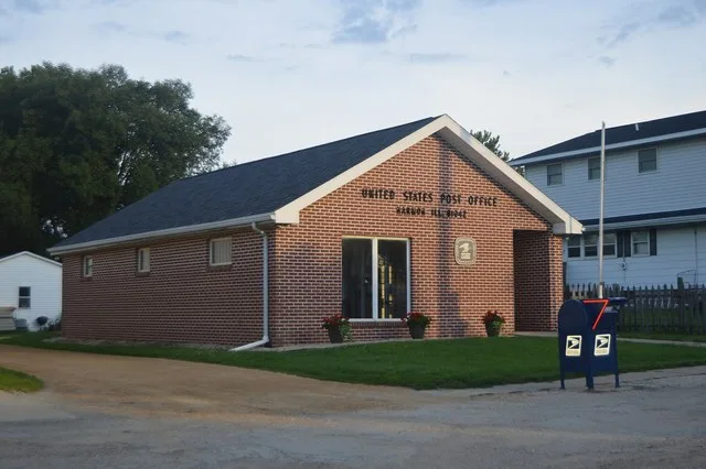 Front and southern side of the post office in Harmon , Illinois , United States , located at 205 N. First Street.