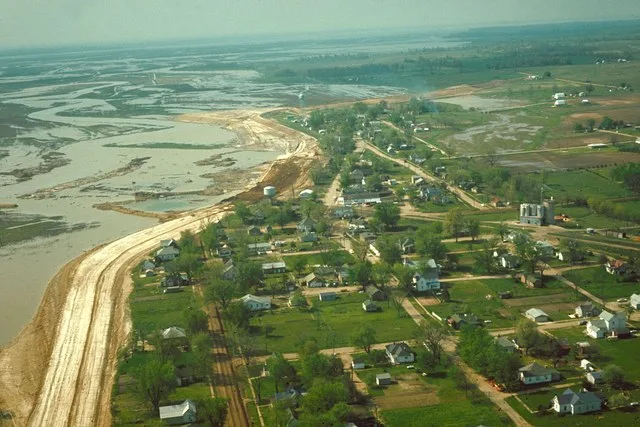 Aerial view of Keyesport, Illinois, USA. The photograph was taken in 1967 or 1968 after the Carlyle Lake Dam had been completed and Carlyle Lake was filling. The town now lies dir...