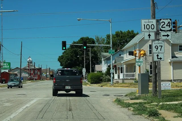 Junction of U.S. Route 24 , Illinois Route 97 , and Illinois Route 100 in Lewistown, Illinois .