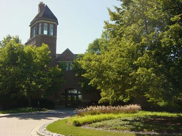 A photo of the village hall of the Illinois village of Lincolnshire .