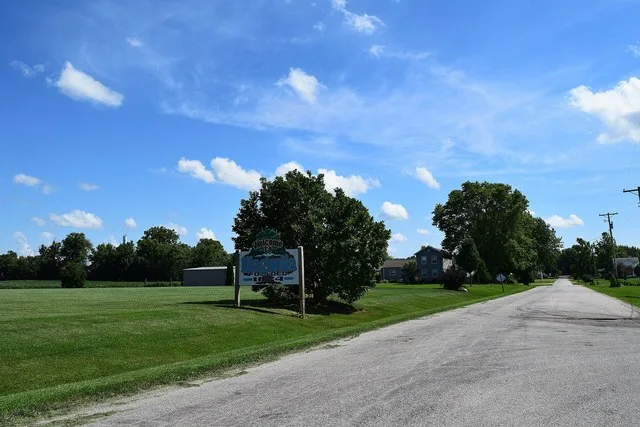 Welcome sign along the road into Magnolia, Illinois .