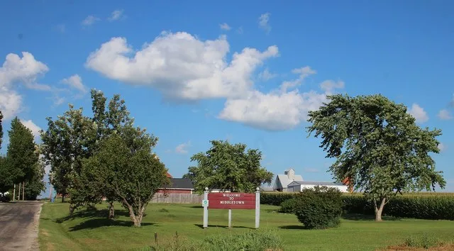 "Welcome ... To Middletown" sign in Middletown , in Corwin Township, Logan County, Illinois .