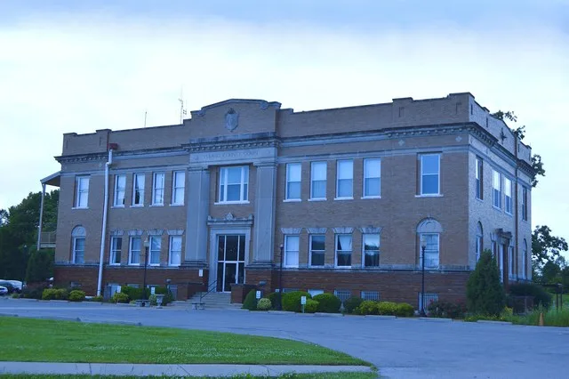 Front and eastern side of the Pulaski County Courthouse , located at 500 Illinois Avenue in Mound City , Illinois , United States . It was built in 1912.