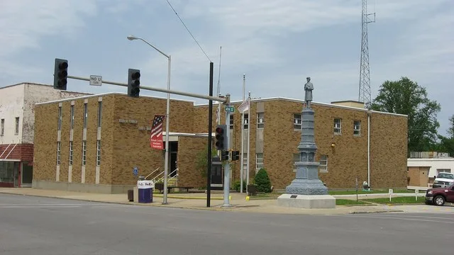 Front of the Wabash County Courthouse, located on the northeastern corner of the junction of Market and Fourth Streets in downtown Mount Carmel , Illinois , United States , and bu...