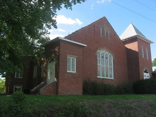Front of the former Oakdale Reformed Presbyterian Church , located on the southwestern corner of the junction of Second and Walnut Streets in Oakdale , Illinois , United States ...