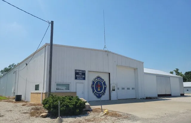 Owaneco Fire Protection District building and adjacent Locust Township highway garage, in Owaneco , in Christian County, Illinois .
