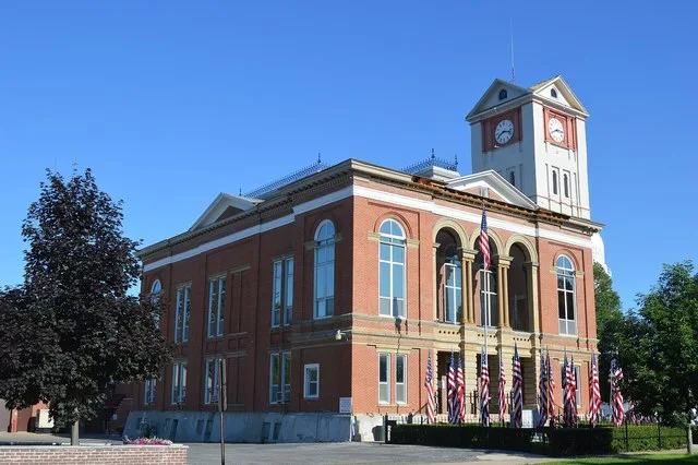 Front and southern side of the Schuyler County Courthouse , located on the southwestern corner of the junction of Congress ( U.S. Route 24 ) and Lafayette Streets in Rushville , I...