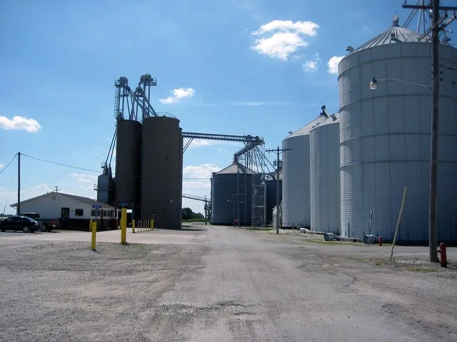 Sciota, Illinois - July 19, 2013 - Douglas Street at Clay Street, Farmers Elevator Company - facing west.