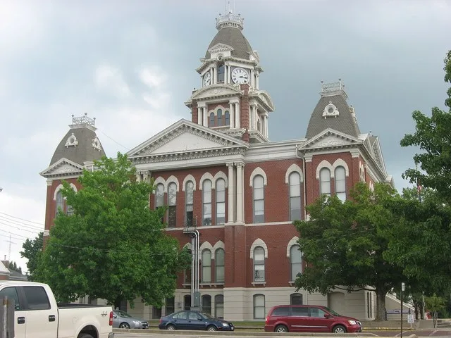 Western side of the Shelby County Courthouse , located at 301 E. Main Street ( Illinois Route 16 ) in Shelbyville , Illinois , United States . Built in 1880, it is part of the She...