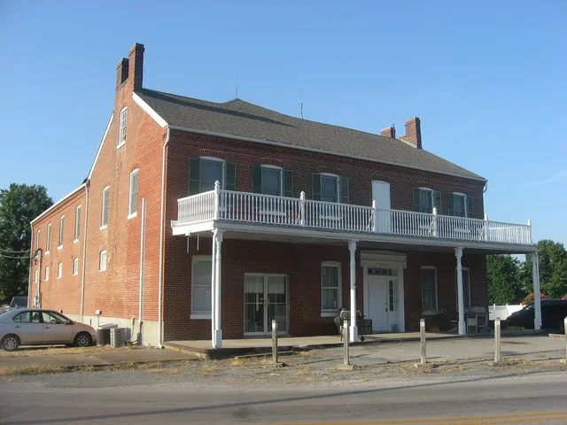 Front and eastern side of the Rutter Store , located at 7346 Illinois Route 15 in St. Libory , Illinois , United States . Built in 1849, it is listed on the National Register of H...