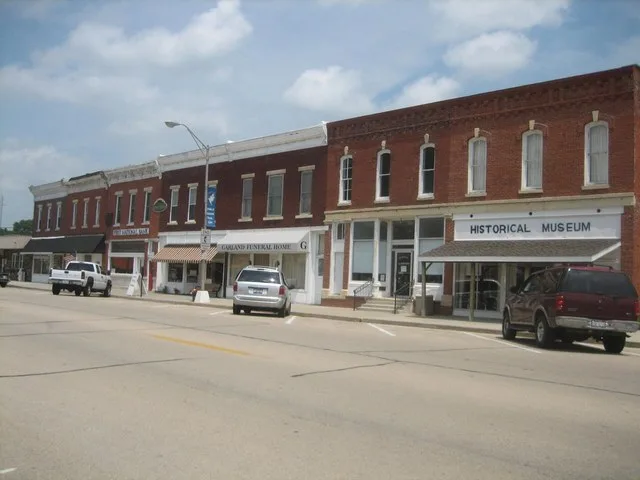 Main Street Historic District, Tampico, Illinois. U.S. National Register of Historic Places. 100 block of Main Street (odd numbers).