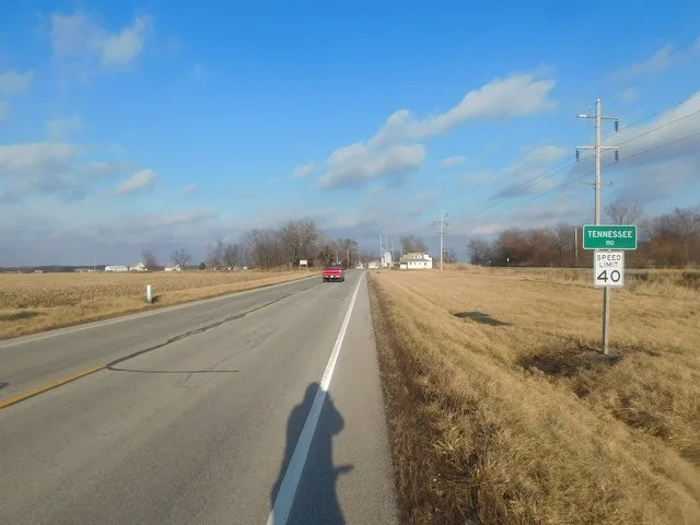 U.S. Route 136 westbound approaching the village of Tennessee, Illinois .