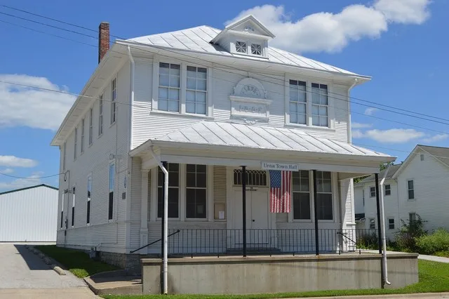 Northern side and front of the Ursa Town Hall , located at 109 S. Warsaw Street ( Illinois Route 109 ) in Ursa , Illinois , United States . Built in 1895, it is listed on the Nati...