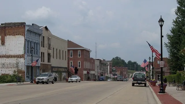 Buildings in the 300 block (and upwards) of West Gallatin Street, looking west, from north side of street (next to the Vandalia Statehouse ), downtown Vandalia, Illinois , USA. Th...