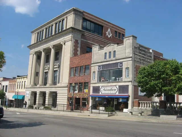 Buildings on the northern side of Fifteenth Street ( U.S. Route 50 ) in downtown Bedford , Indiana , United States . These buildings are part of the Bedford Courthouse Square Hist...