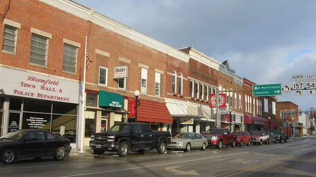 Buildings in the first block of E. Main Street ( U.S. Route 231 / State Road 54 ) in downtown Bloomfield , Indiana , United States .