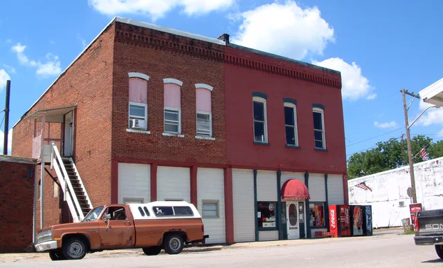 Storefronts at the corner of White Street and Division Street in the town of Clarks Hill in Tippecanoe County, Indiana . Photo looks north.