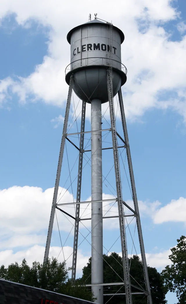 The water tower in Clermont , a town in western Marion County, Indiana .