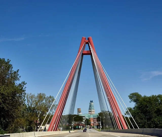 Support cables on J. Muller International's Robert N. Stewart Bridge across the Flatrock River in Columbus, a south-central Indiana city that has become a destination for fine art...