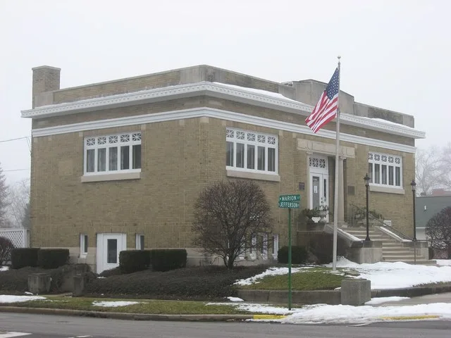 Front and southern side of the Converse-Jackson Township Public Library , a Carnegie library located at the intersection of Marion and Jefferson Streets on the Miami County side o...
