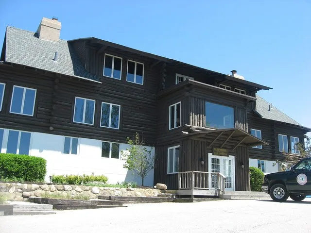 Front of the Dune Acres Clubhouse , located at the upper end of Clubhouse Drive in Dune Acres , Indiana , United States . Built in 1925, it is listed on the National Register of H...