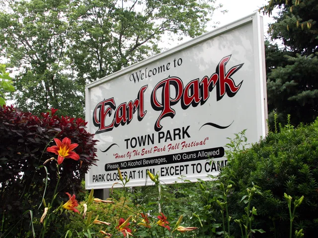 The entrance sign for the town park of Earl Park, Indiana .