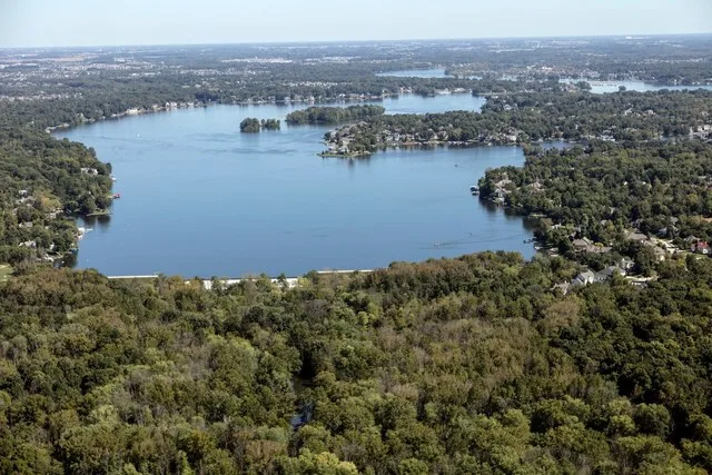 Aerial view of Geist Reservoir and surrounding housing developments in Indianapolis suburb of Fishers, Indiana, United States.