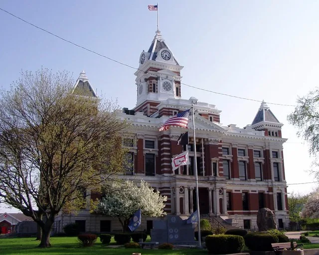 Front of the Johnson County Courthouse , located on Courthouse Square in downtown Franklin , Indiana , United States . Built in 1879, the courthouse is part of two historic distri...