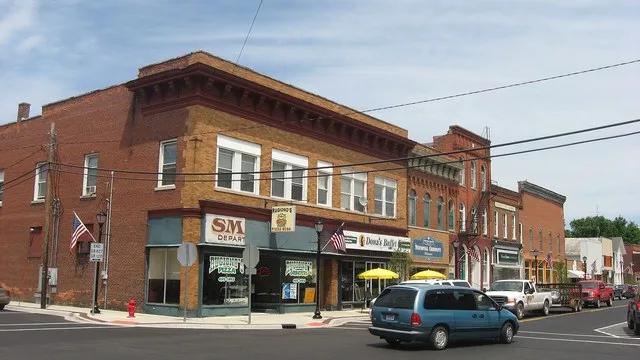 Buildings on the northern side of the 100 block of E. Toledo Street ( State Road 120 ) in Fremont , Indiana , United States . From left ot right, the five brick buildings are: 101...