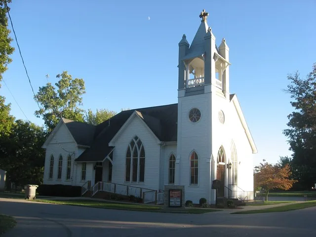 Front and western side of the Simpson Memorial United Methodist Church , located at 9449 Harrison Street in Greenville , Indiana , United States . Built in 1899, it is listed on t...