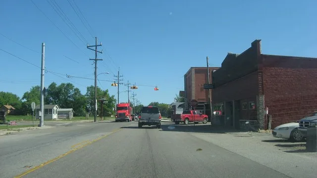 Overview of the central intersection in La Crosse , Indiana , United States . Photo is taken looking northward on Washington ( U.S. Route 421 ) toward Main ( State Road 8 ).