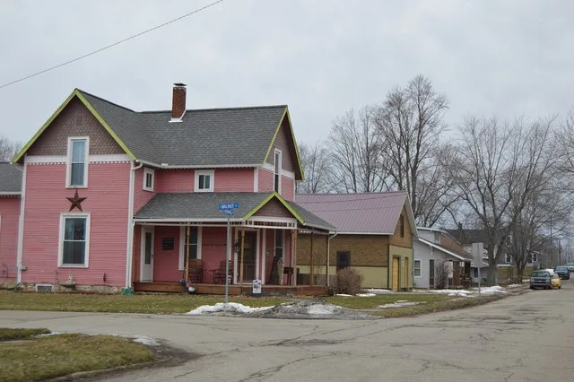 Houses on the southern side of Kendall Street at the Walnut Street intersection in La Fontaine , Indiana , United States . This block is part of the LaFontaine Historic District ...