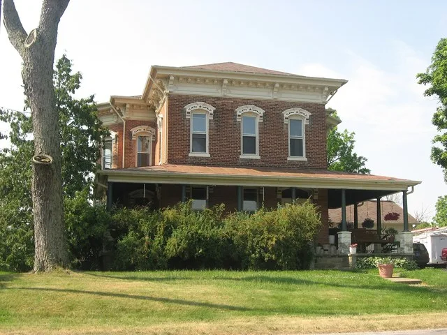 Front of the Dr. Christopher Souder House , located at 214 W. Main Street ( State Road 5 ) in Larwill , Indiana , United States . Built in 1877, it is listed on the National Regis...