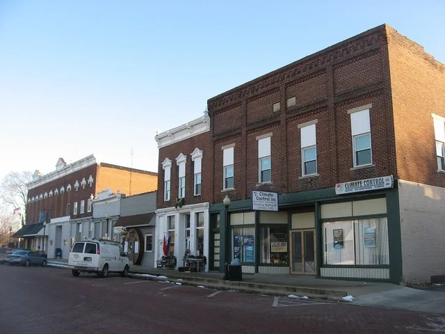 Buildings on the southern side of the first block of W. Van Buren Street in Leesburg , Indiana , United States . Built in 1890, 1907, and 1915, this block is a part of the Leesbur...