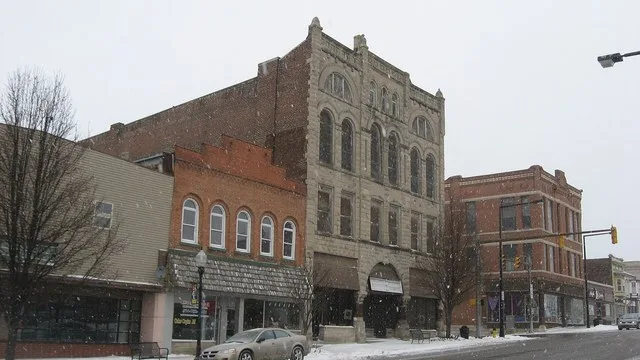 Buildings on the northern side of Broadway between Fifth and Sixth Streets in downtown Logansport , Indiana , United States . From left to right, they are: 520 Broadway: 1960, no...