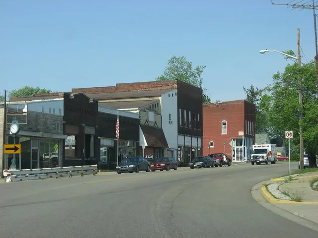 Buildings on the southern side of the 100 block of W. Broad Street ( State Road 67 ) in downtown Lyons , Indiana , United States .