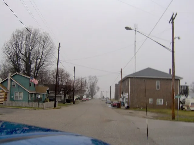 View of the main street of Onward, Indiana , taken out of the window of the car visible in the bottom left corner. Picture taken by Nyttend on 15 January 2007.