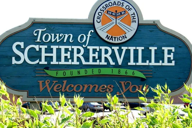 Intersection of Main St. and US. 41. Welcome to Schererville sign.