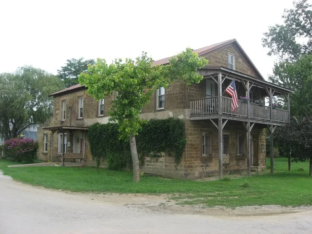 Front and western side of the Nester House , located at 300 Water Street in Troy , Indiana , United States . Built in 1863, it is listed on the National Register of Historic Place...
