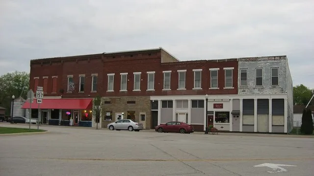 Buildings on the eastern side of Commercial Street ( U.S. Route 231 and State Roads 67 / 157 ) just south of the First Street intersection in central Worthington , Indiana , Unite...
