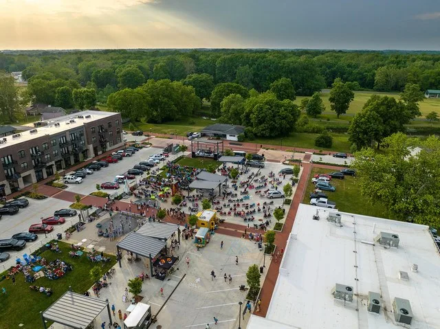 A Summer Concert at town center in Yorktown next to the Town Hall, The Oliver, and overlooking Morrow's Meadow.