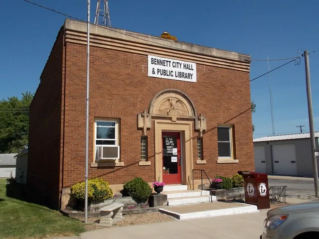 The city hall and public library in Bennett, Iowa.