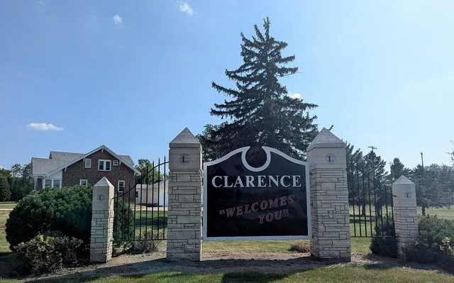 Clarence, Iowa, welcome sign