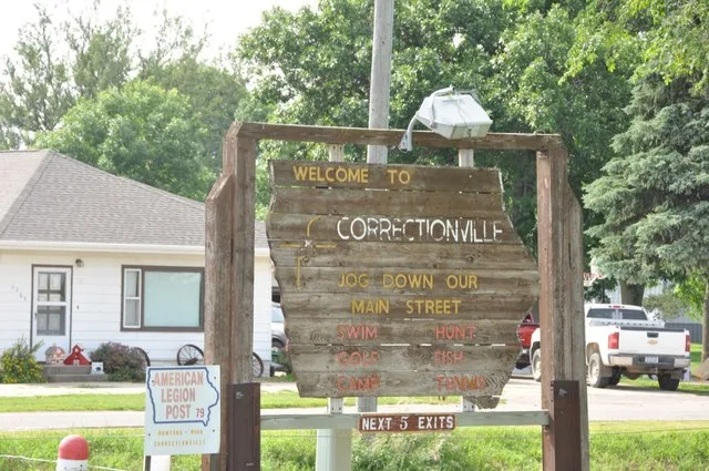 Sign welcoming visitors to Correctionville, Iowa .