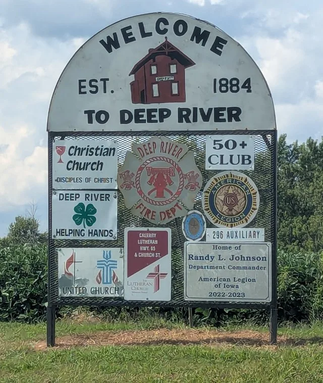 The welcome sign for Deep River, Iowa