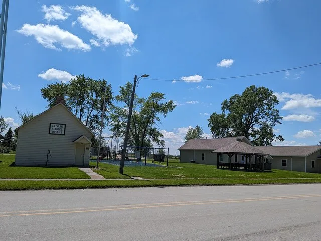 "The Old School" (left) next to a public park in Exline, Iowa