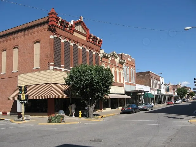 Downtown Fort Madison, Iowa. Buildings are located along Avenue G in the Fort Madison Downtown Commercial Historic District , listed on the National Register of Historic Places