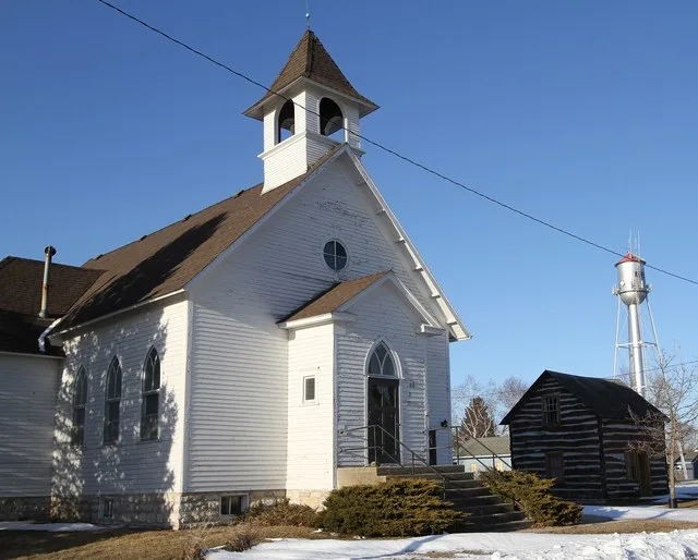 First Methodist Episcopal Church with the water tower in the background in Kensett, Iowa, United States